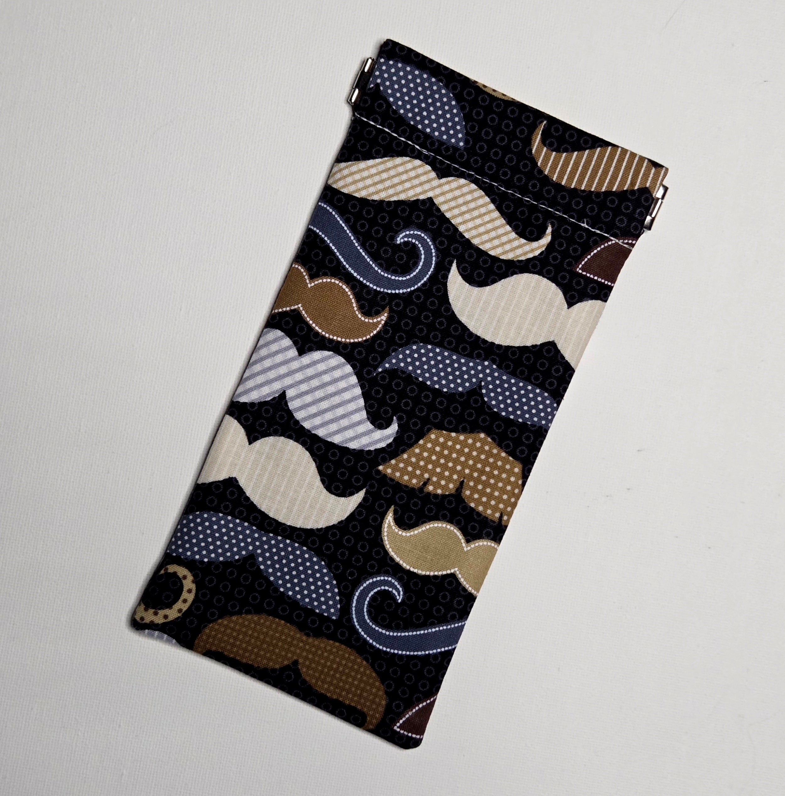 Sunglasses pouch in moustache fabric