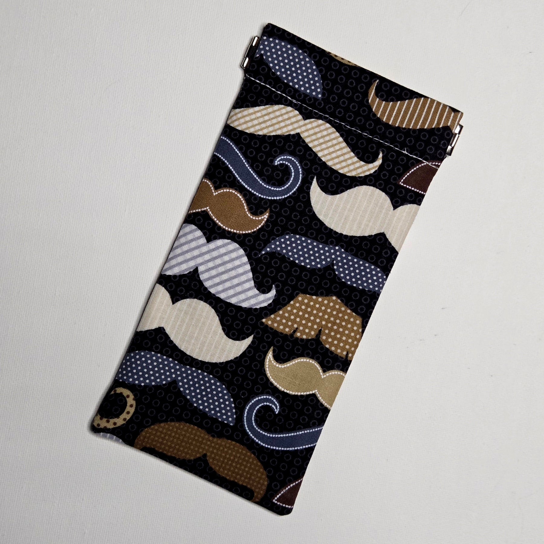 Sunglasses pouch in moustache fabric