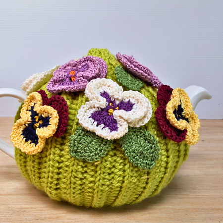 Pansies on green tea cosy for medium teapot
