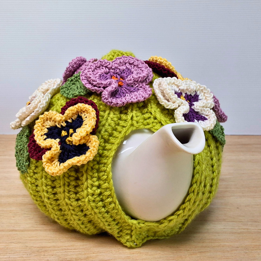 Pansies on green tea cosy for medium teapot