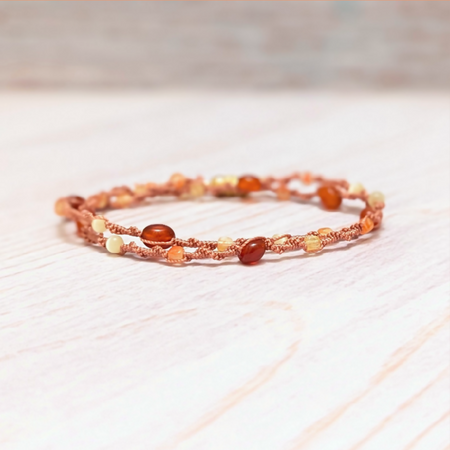 Macrame bracelet with carnelian gemstones and glass beads