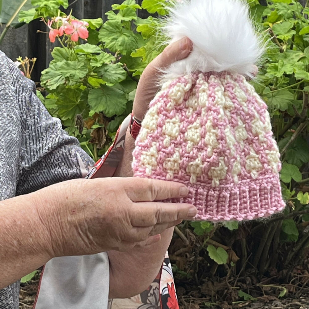 Holding beanie