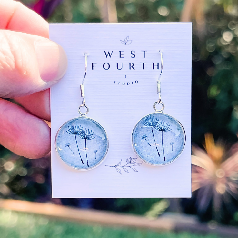 blue-grey-dandelion-earrings-on-card