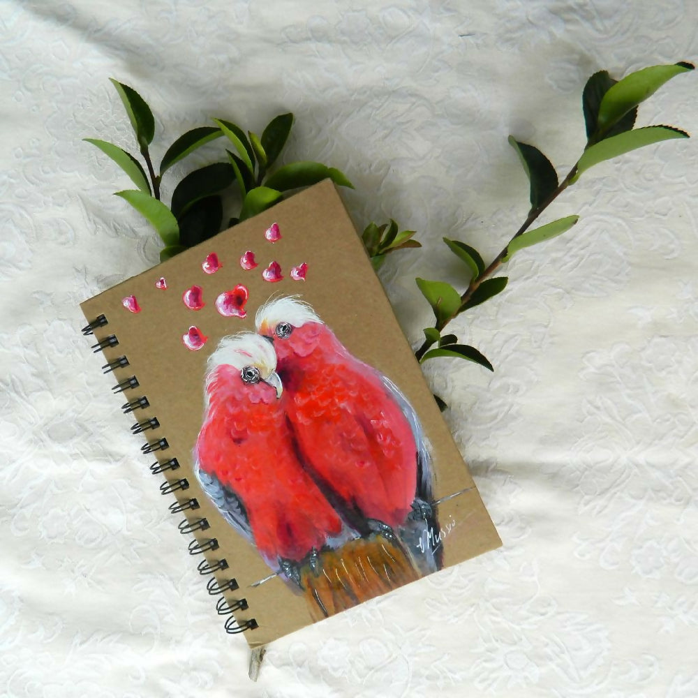 galahs with branch on cloth