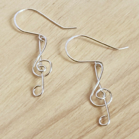 Simply treble clef dangle earrings in sterling silver