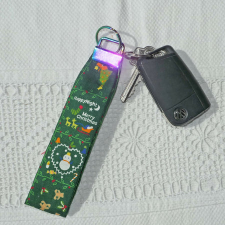 Christmas themed key fobs. Stocking filler. Fun gift. Free post.