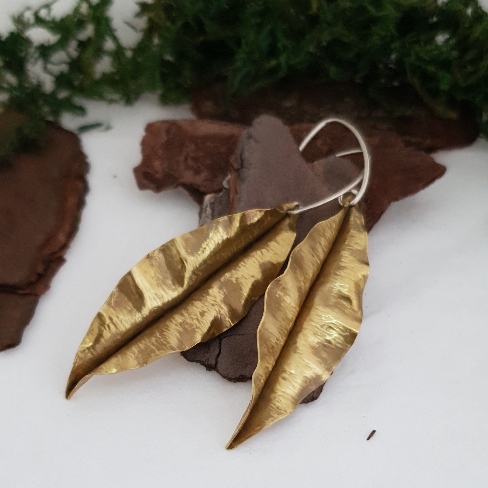 Golden brass leaf earrings