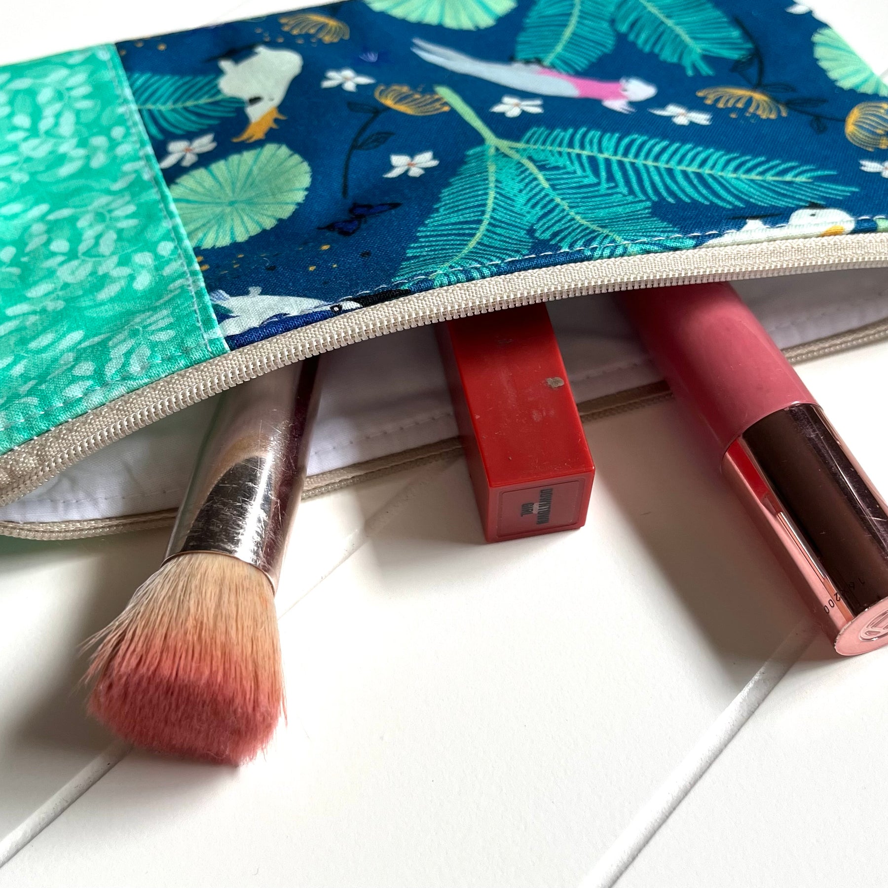 Blue and mint birds purse