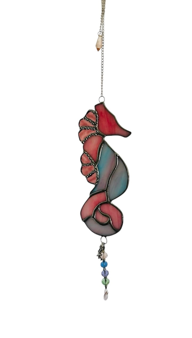 Stained glass seahorse in shades of pink