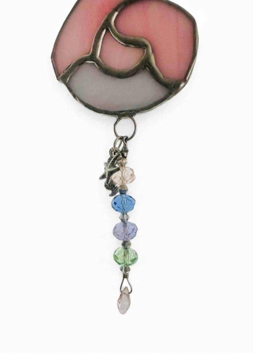 Stained glass seahorse in shades of pink