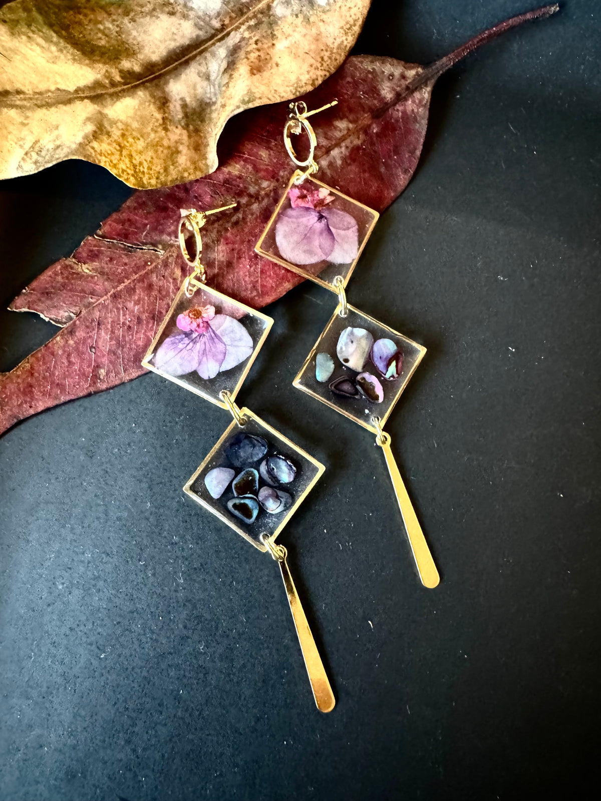 Double rhombus cowrie shell and pressed flower resin earrings