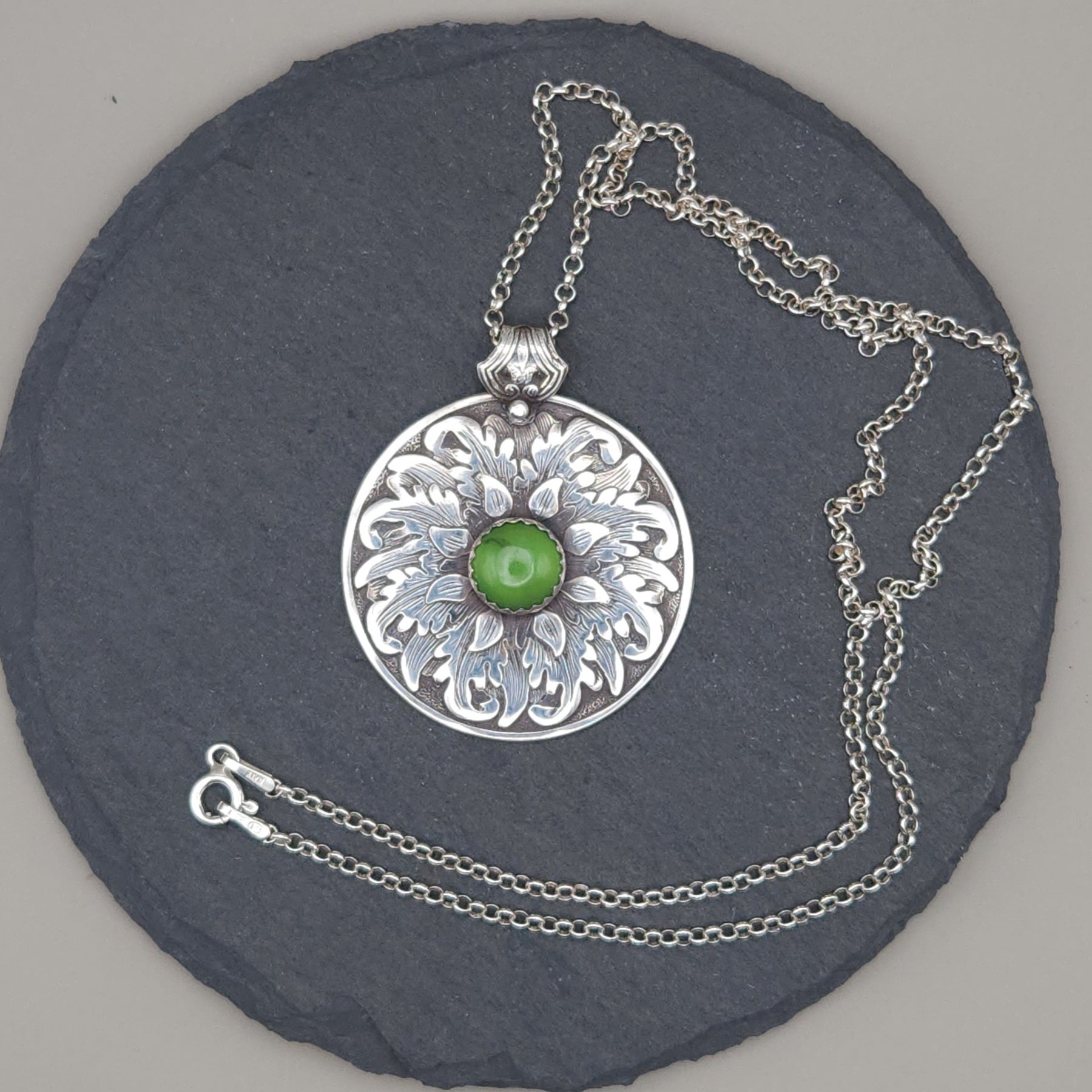 Leafy medallion with serpentine