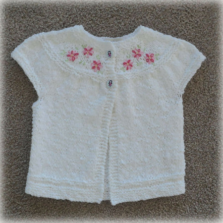 Custom order white ss cardigan with embroidered yoke.