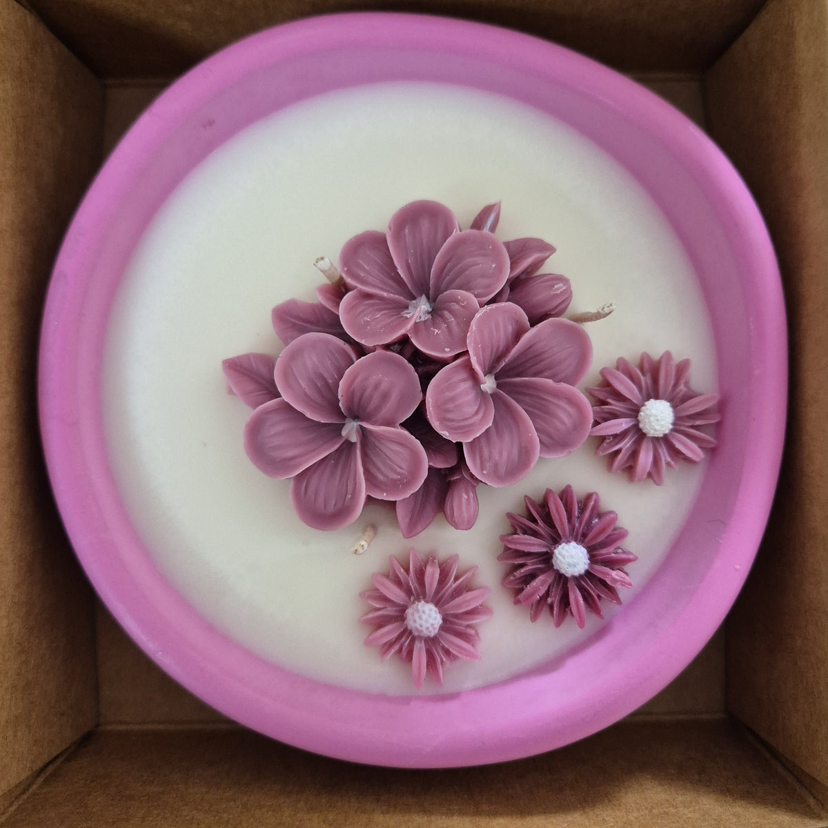 Concrete organic shaped bowl candle with black raspberry lime fragrance