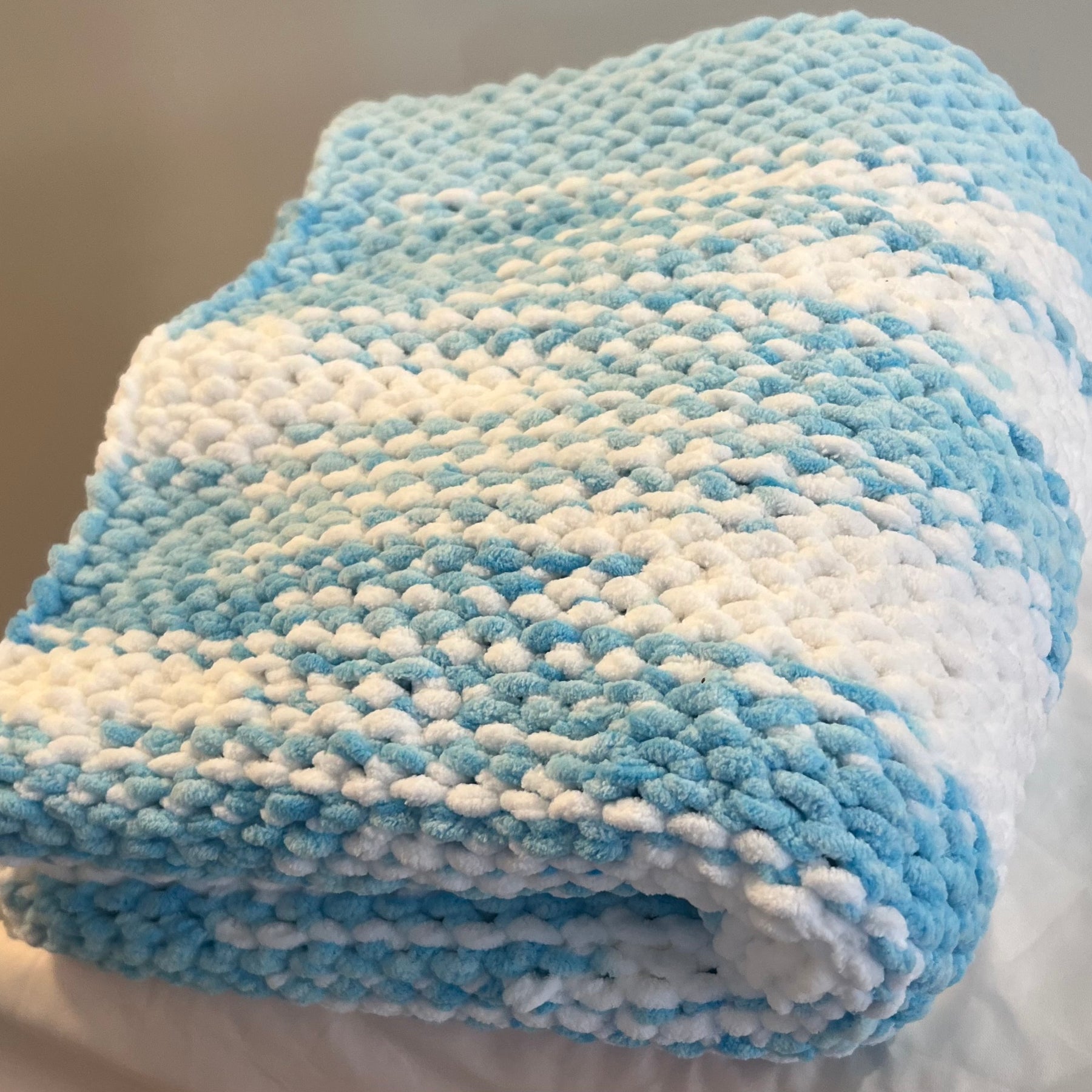 Blue and white baby blanket or lap blanket
