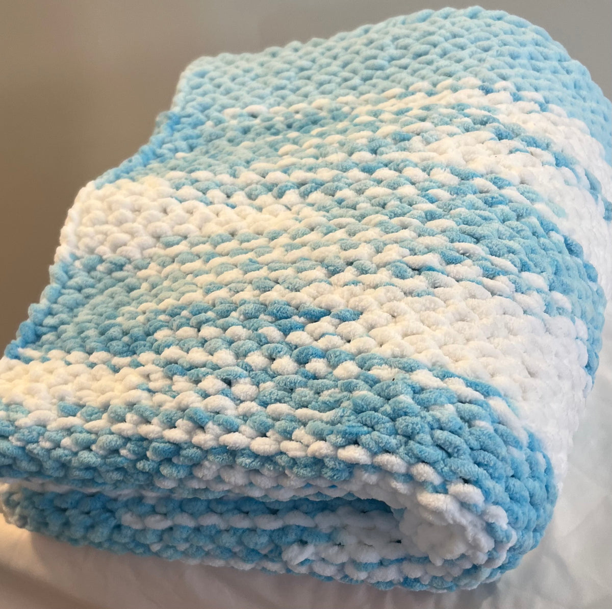Blue and white baby blanket or lap blanket