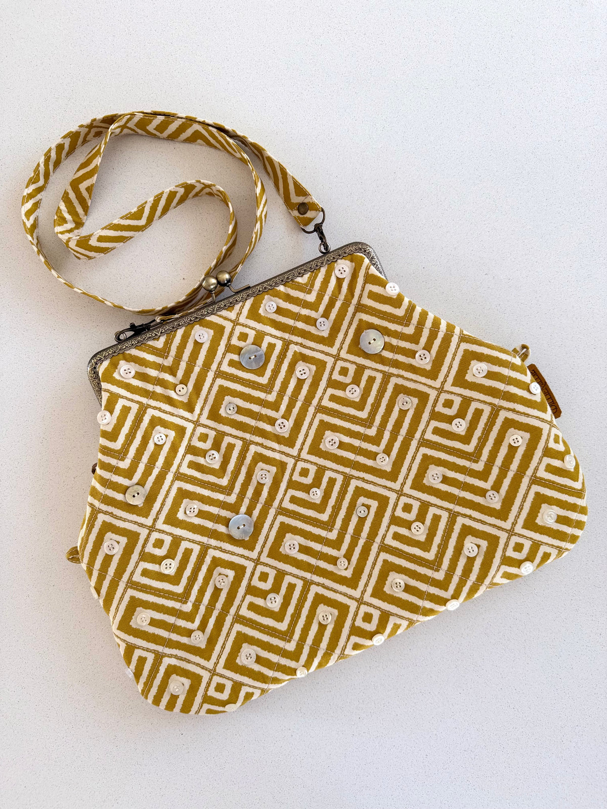 Metal frame oversized purse