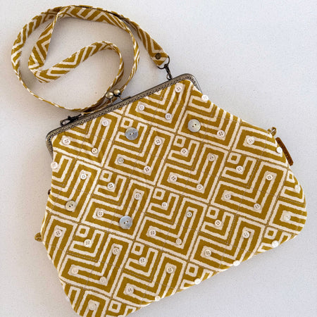 Metal frame oversized purse