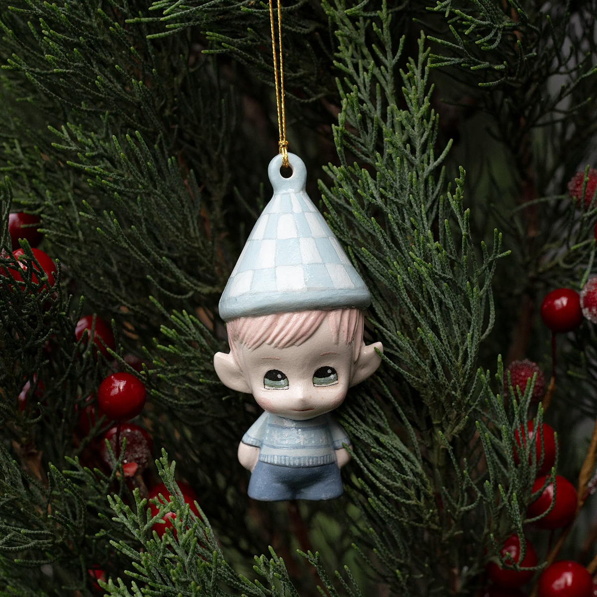Handmade Porcelain Christmas ornament. One-of-a-kind. Sally, the Christmas Sweater designer Elf.