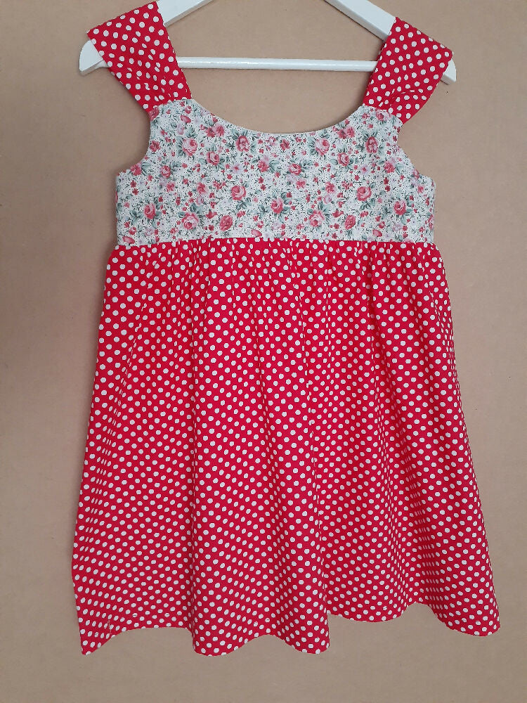 Cute child's dresses sizes 1-6. One-Of-A-Kind Print Bodice with Contrasting Spotty Skirt & Straps.