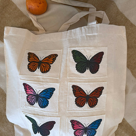 Calico tote bag with a hand screen printed design