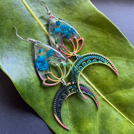 Iridescent rainbow resin earrings with pressed flowers