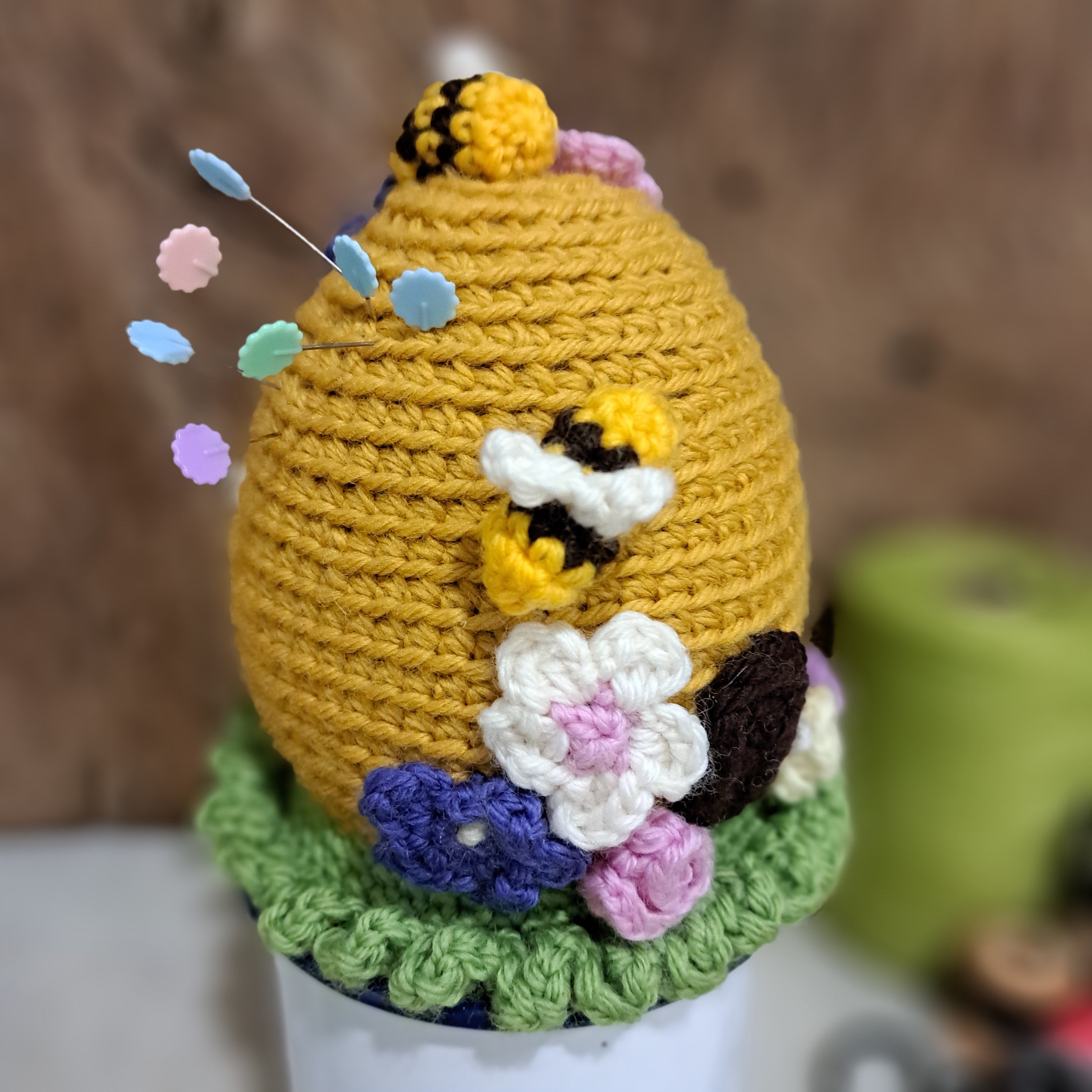 Beehive pin cushion in a sturdy enamel tin mug