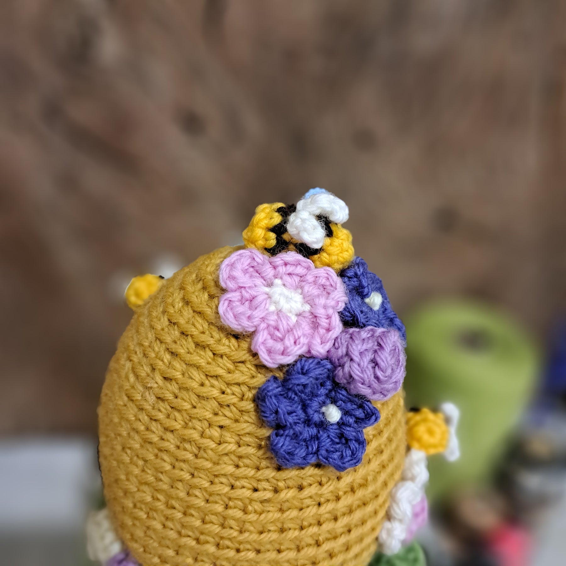 Crochet beehive pin cushion in a sturdy enamel tin mug
