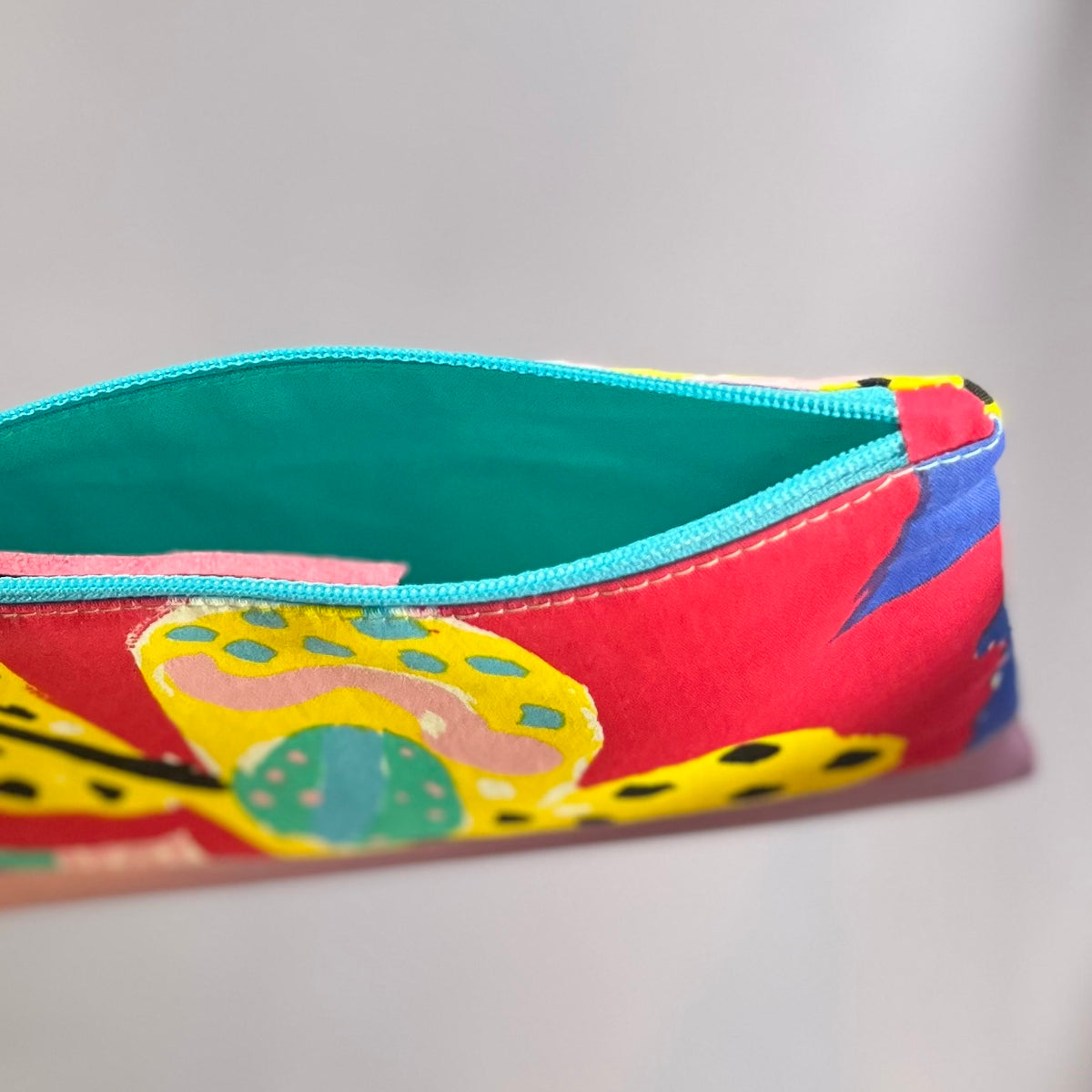 Colourful, repurposed vintage fabric zip POUCH with leather