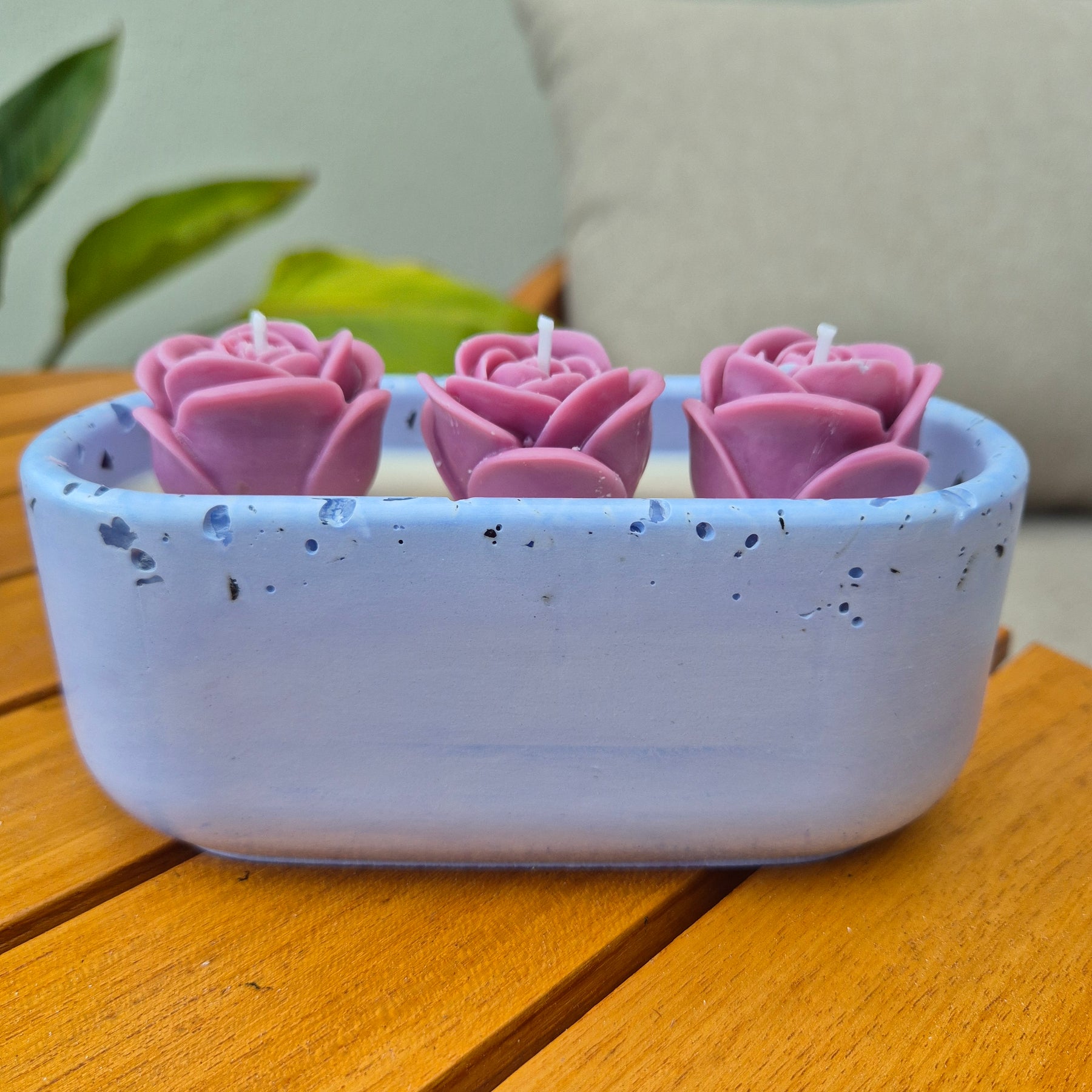Pale blue concrete bowl candle with quartz stones and roses