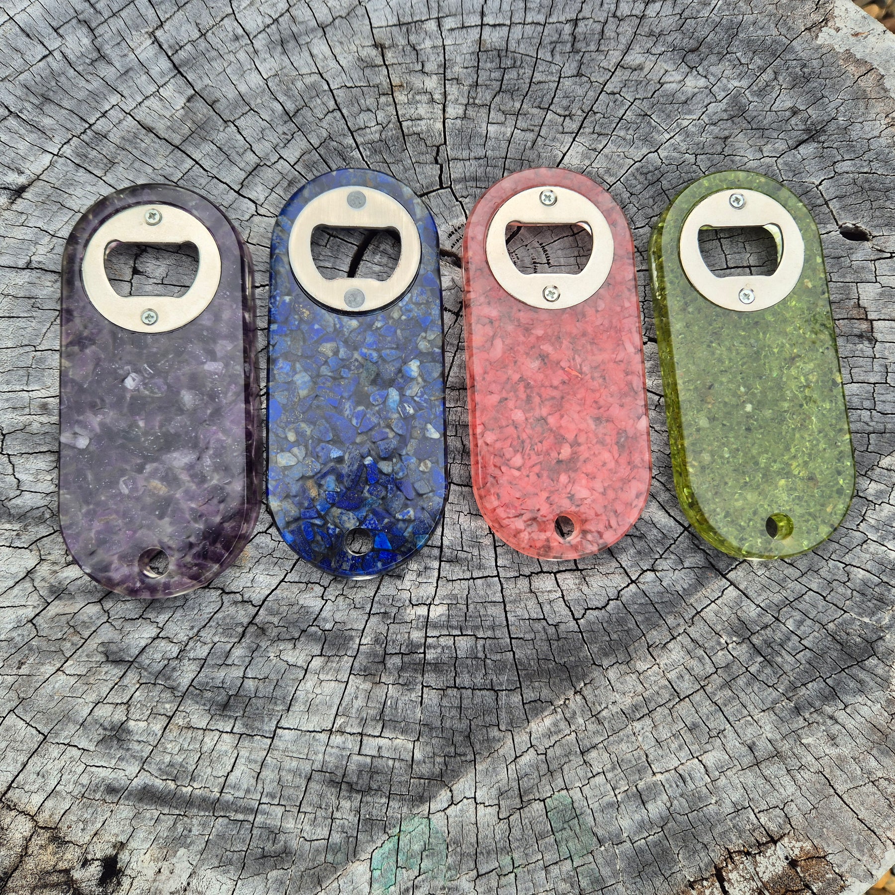 Resin bottle opener with inlaid peridot stones