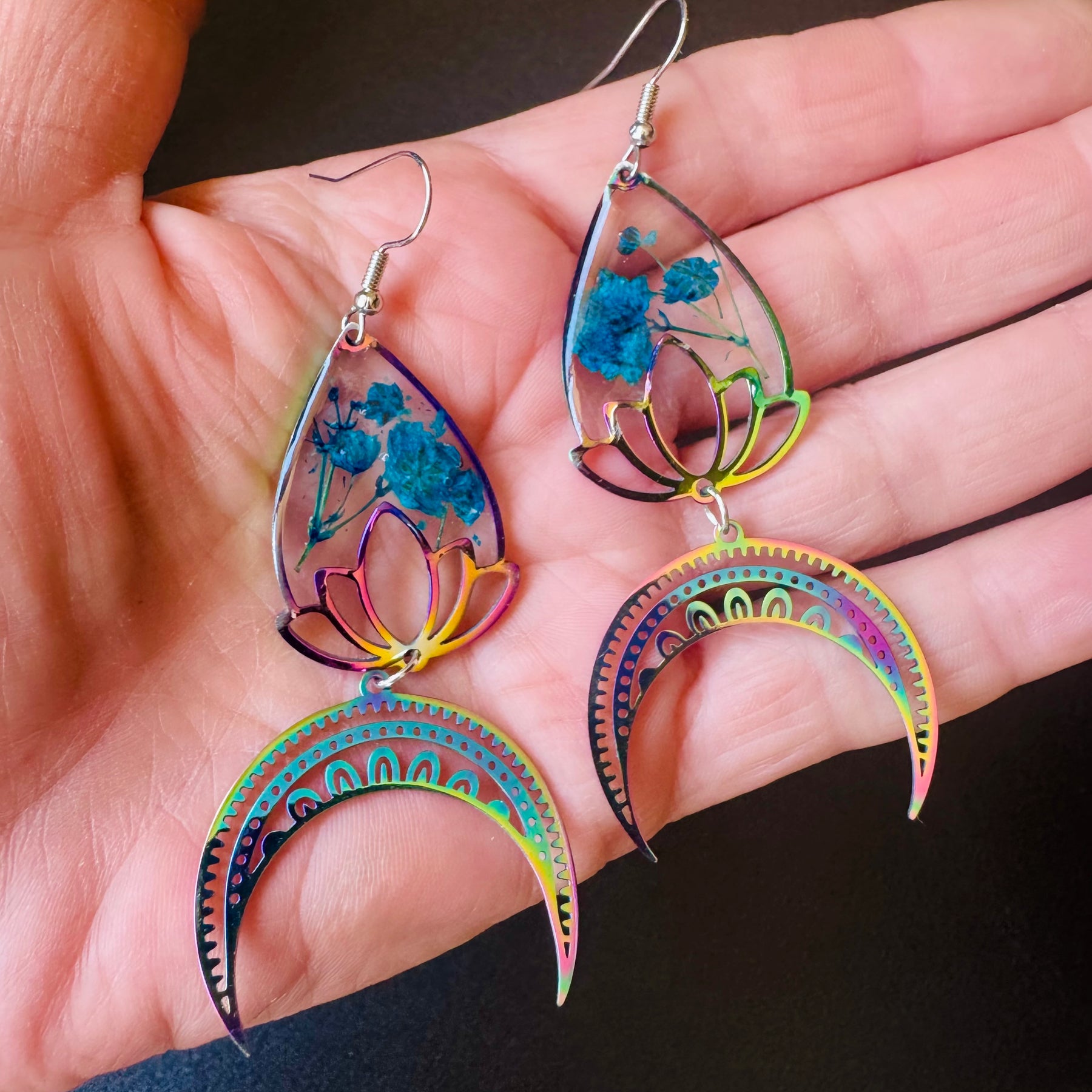 Iridescent rainbow resin earrings with pressed flowers