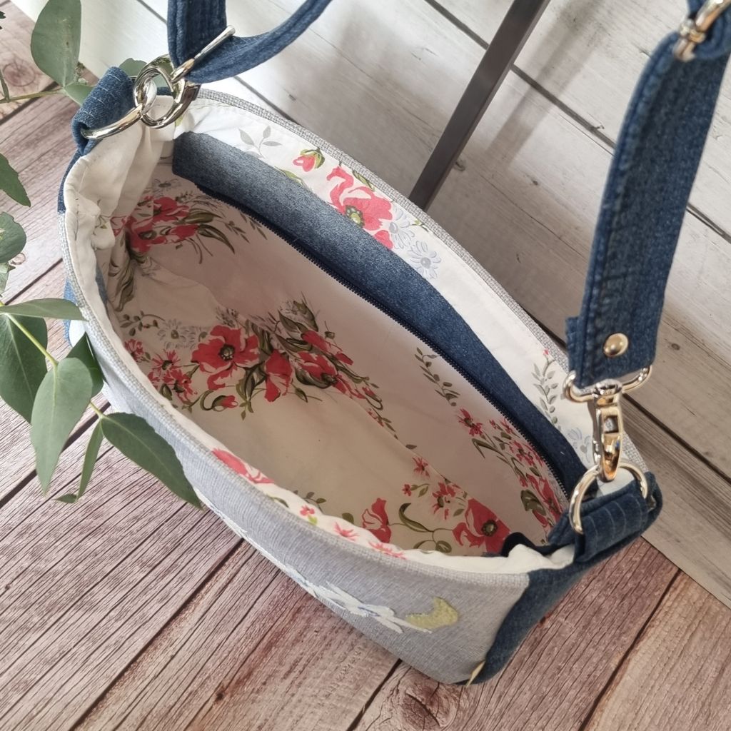 Handmade appliqued crossbody zip bag - blue with flannel flowers
