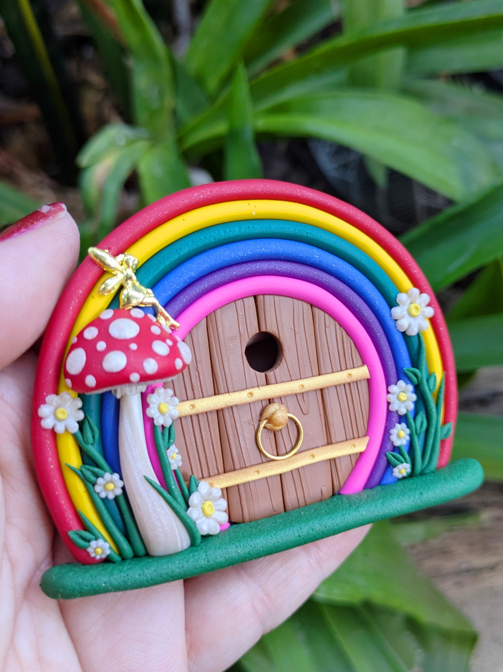 Mini Rainbow Fairy Door with Golden Fairy on Red Mushroom