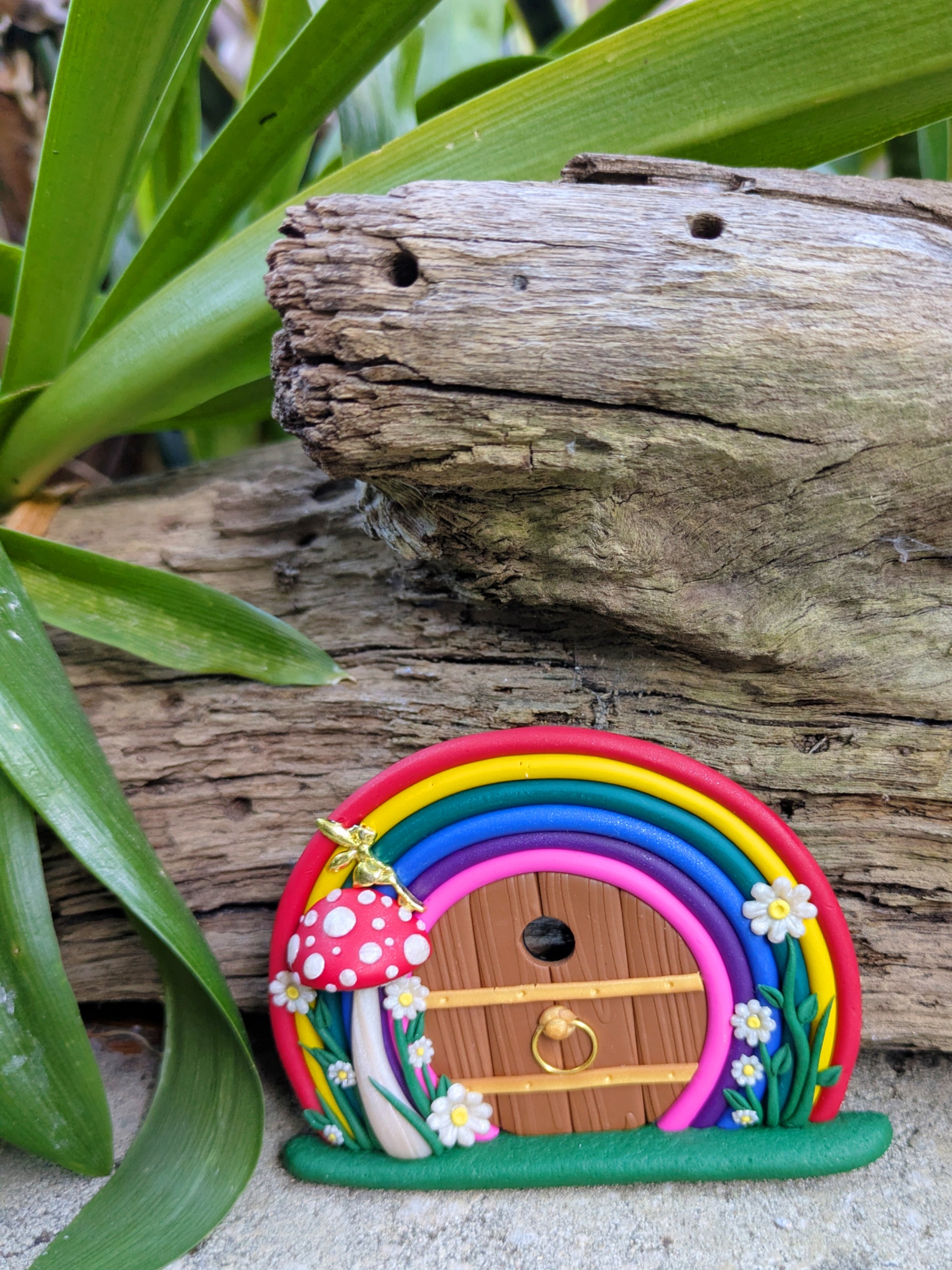 Mini Rainbow Fairy Door with Golden Fairy on Red Mushroom