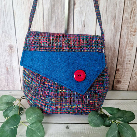 Upcycled vintage-inspired barrel handbag - woven multicolour with bright blue flap