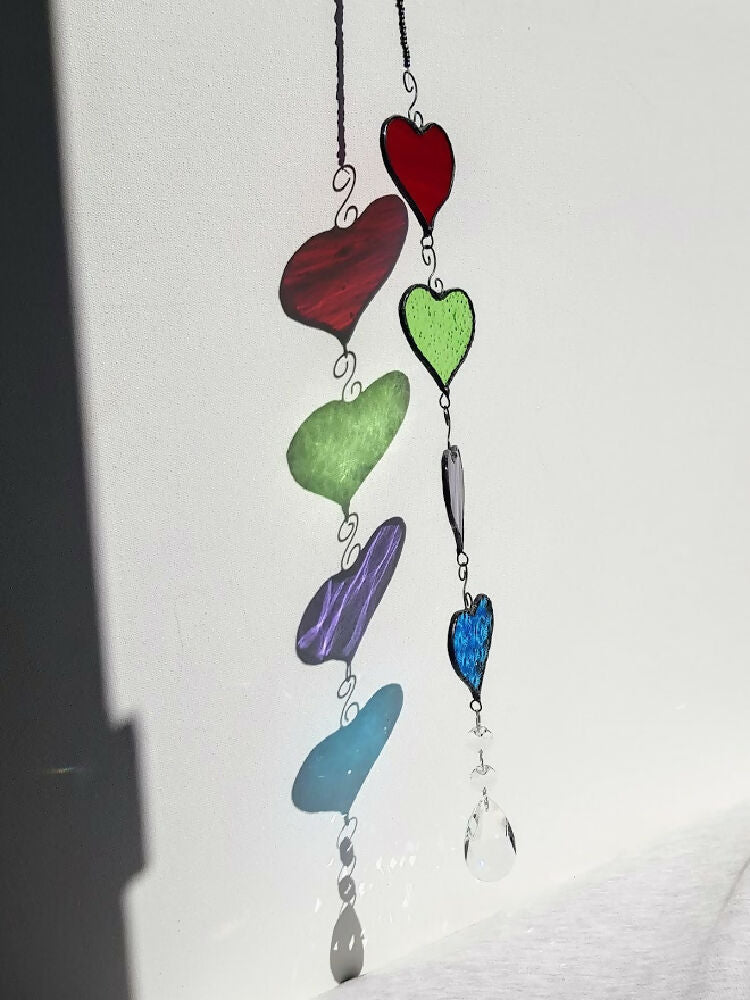 four colourful stained glass hanging hearts, hanging chain of hearts