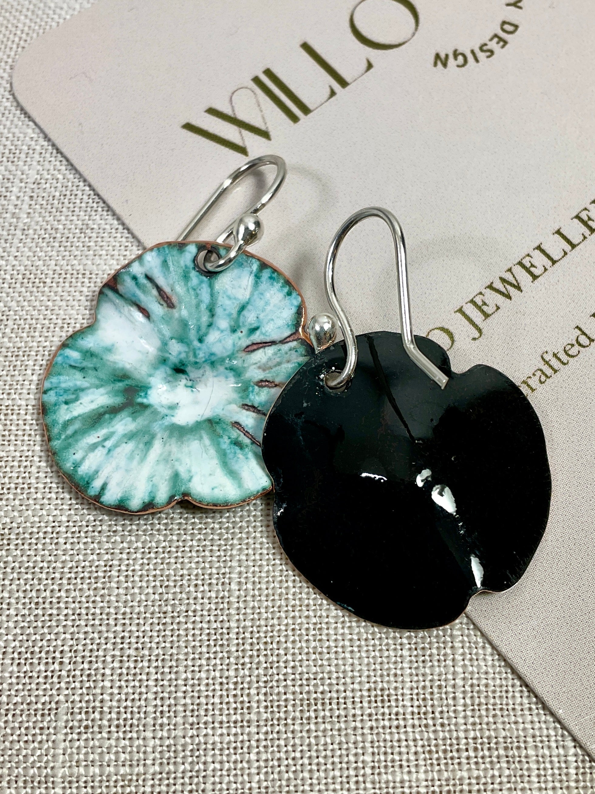 Teal and white flowers. Enamel earrings