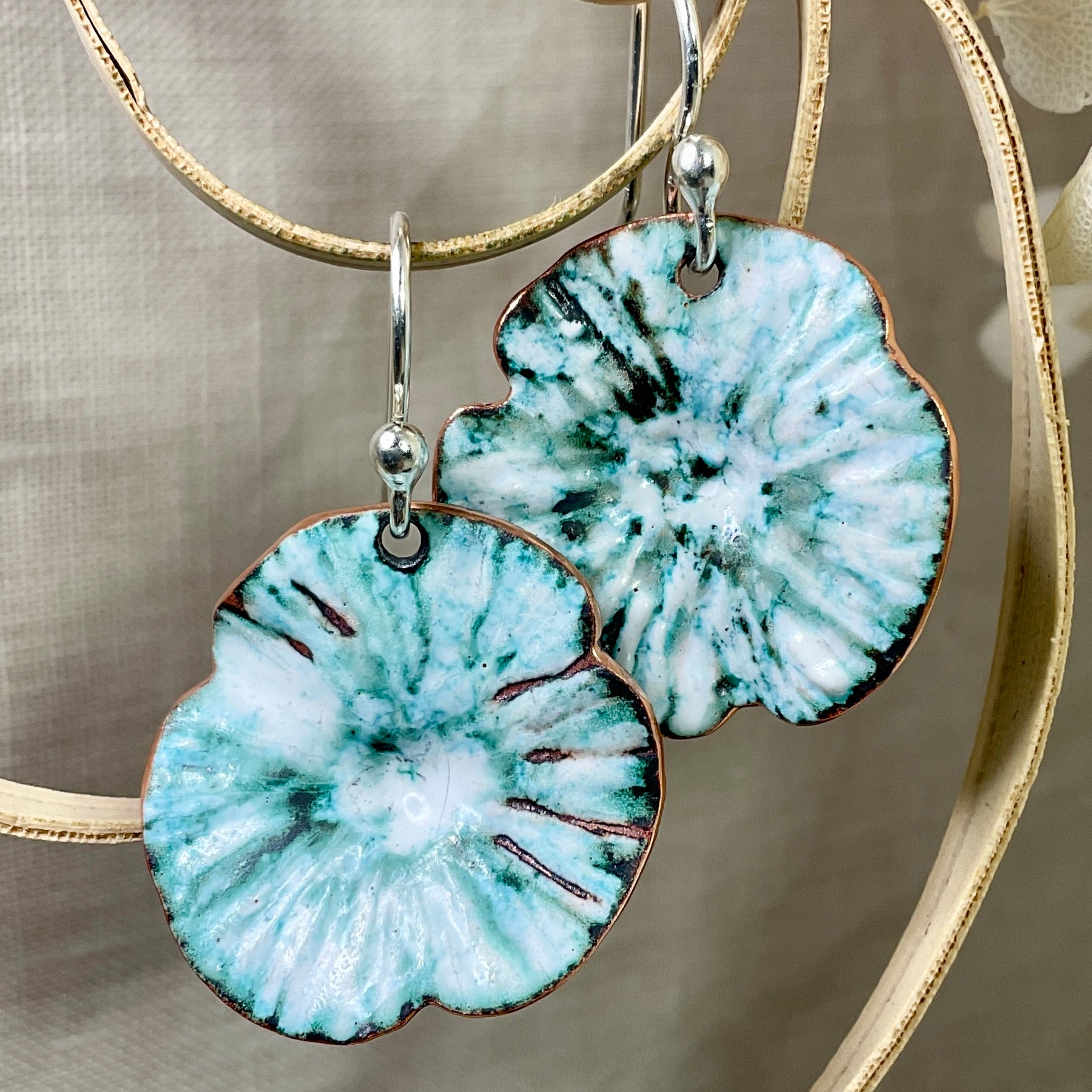 Teal and white flowers. Enamel earrings