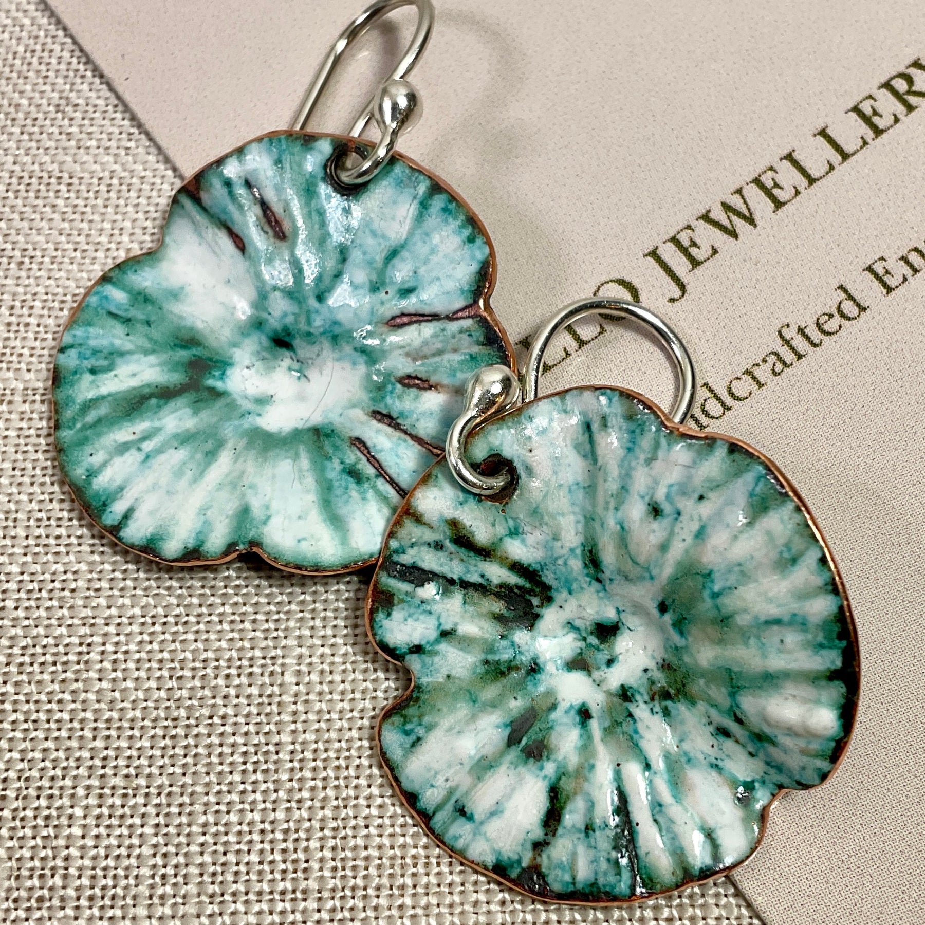 Teal and white flowers. Enamel earrings