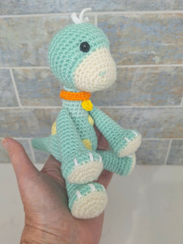 Hand made Dotty the dinosaur crocheted toy