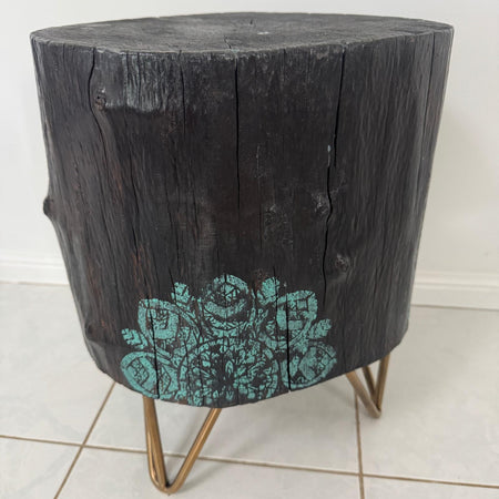 Timber stump table featuring teal mandala hand-painted artwork