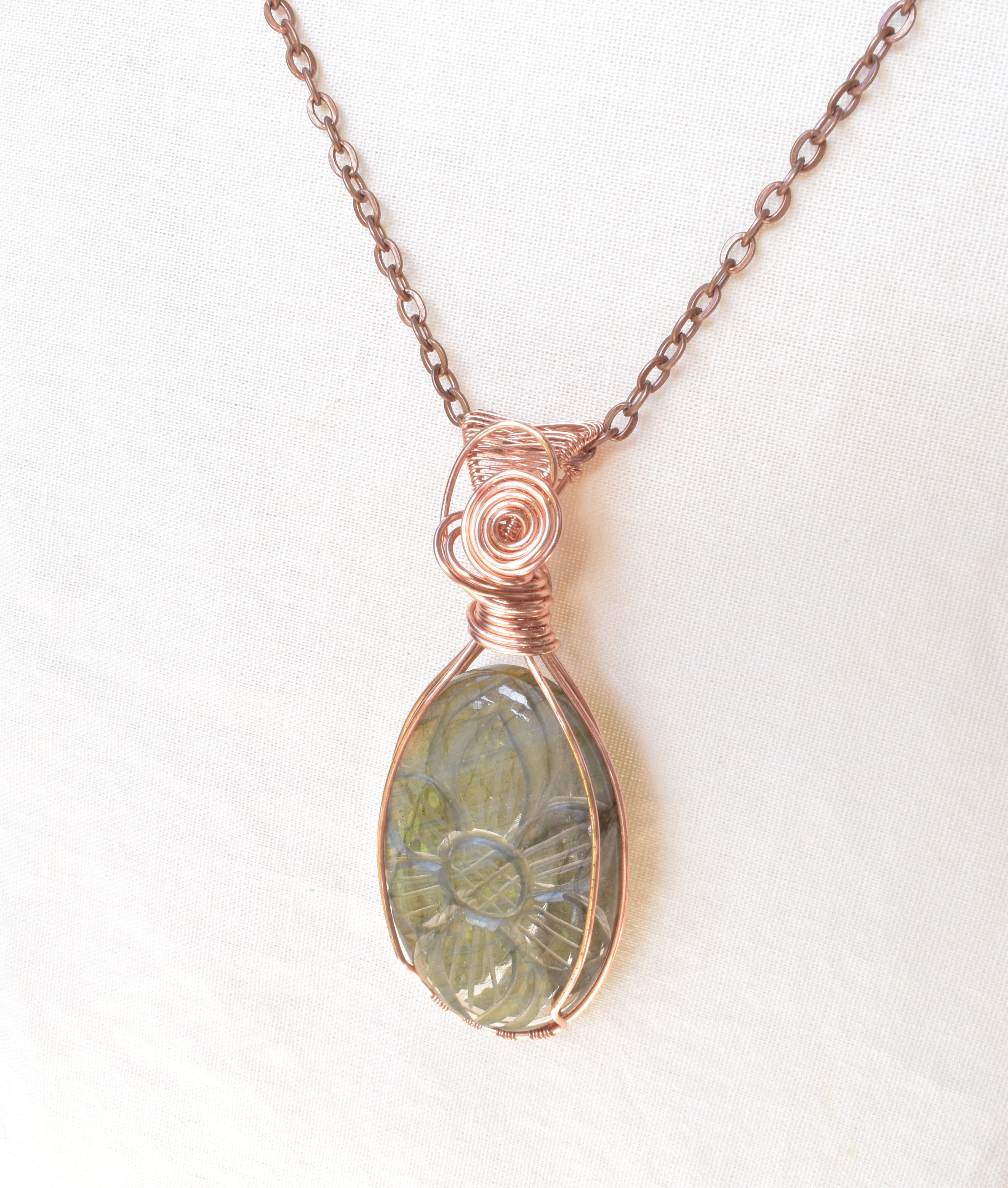 Ancient Bloom – Handcrafted Carved Labradorite Pendant
