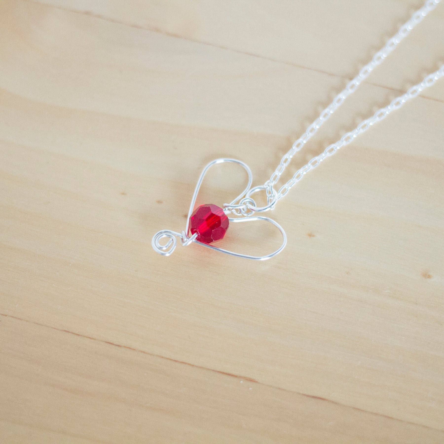 Silver Heart and Red Crystal Pendant Necklace and Earrings Set