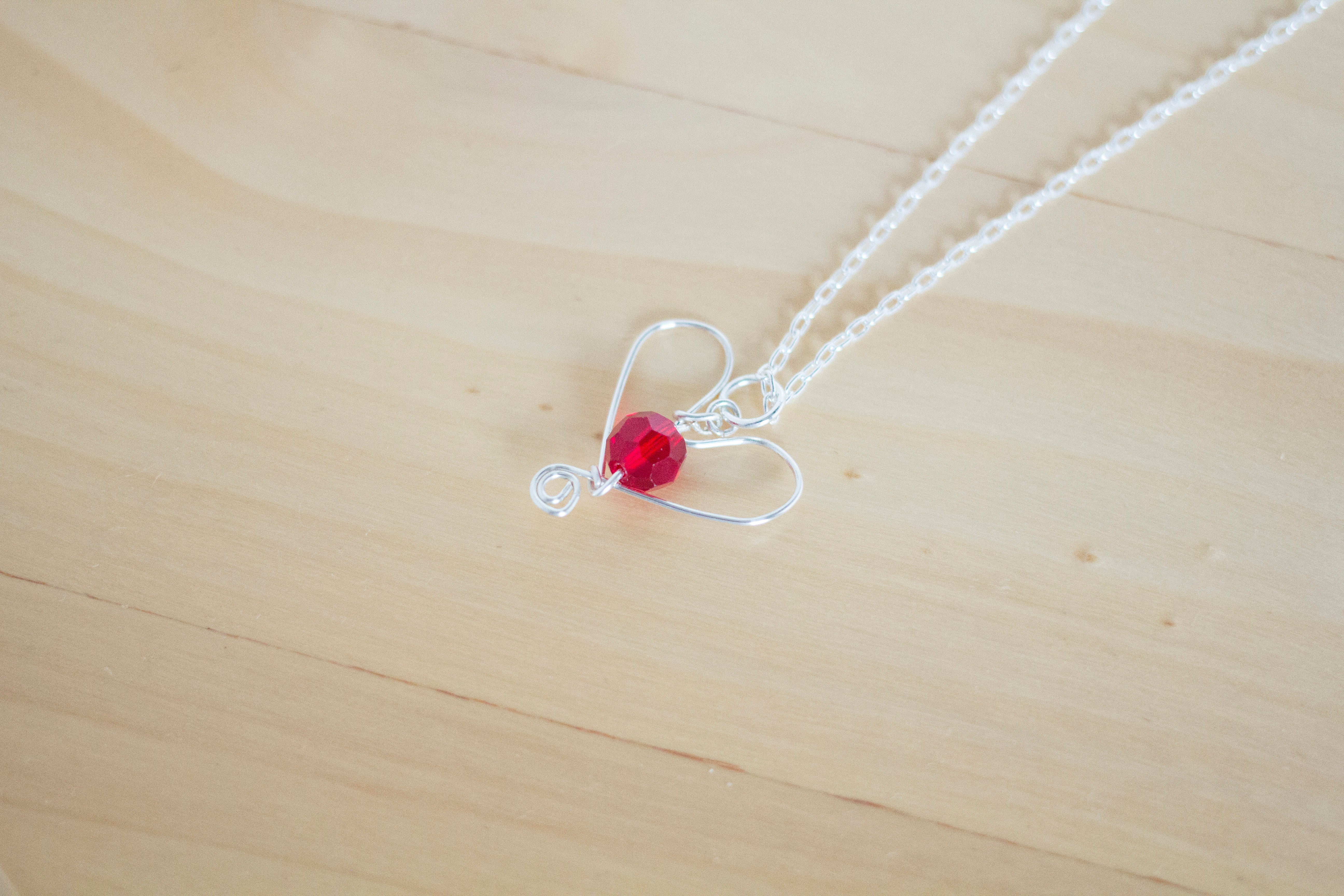 Silver Heart and Red Crystal Pendant Necklace and Earrings Set