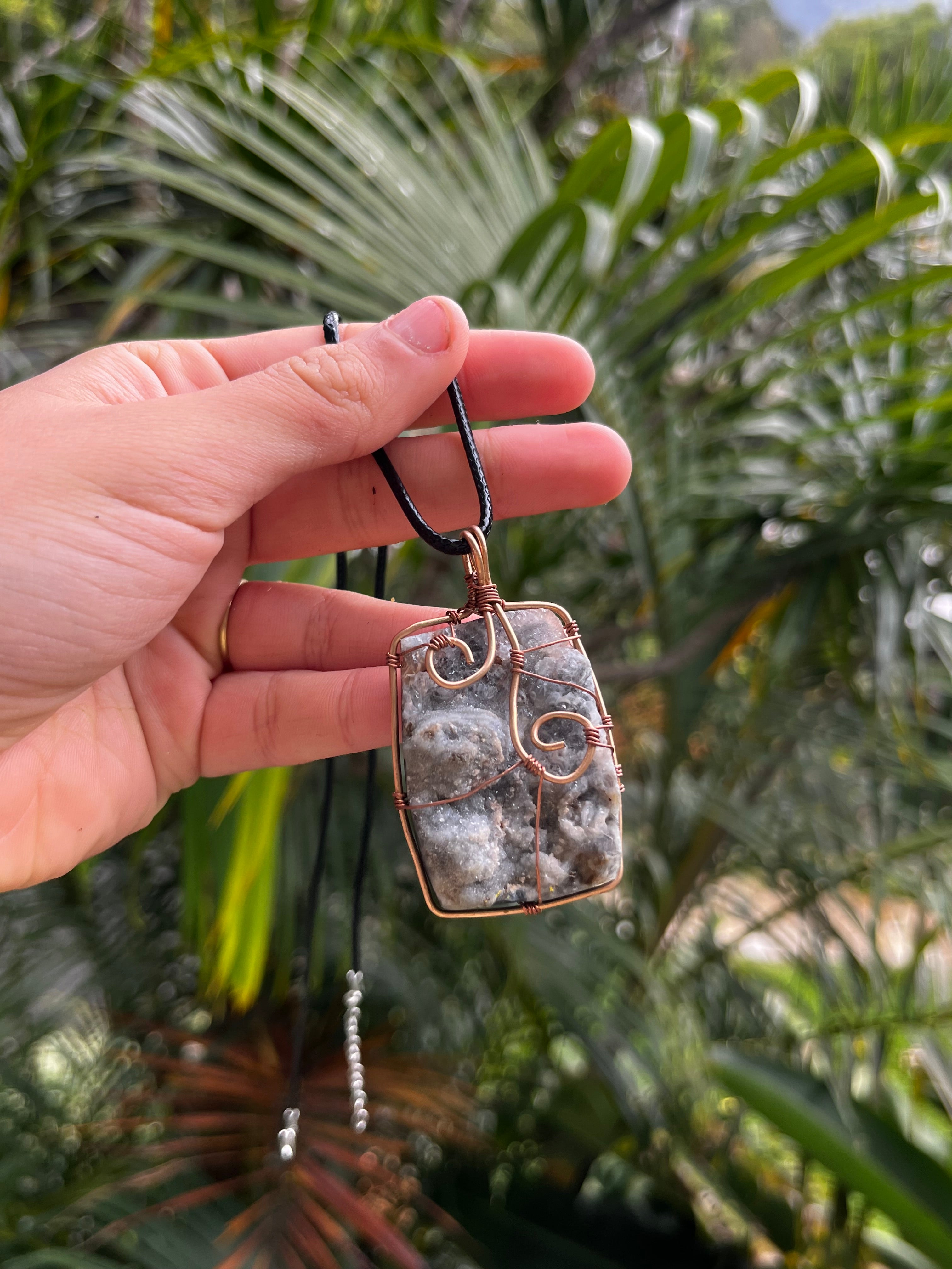 Agate and bronze pendant