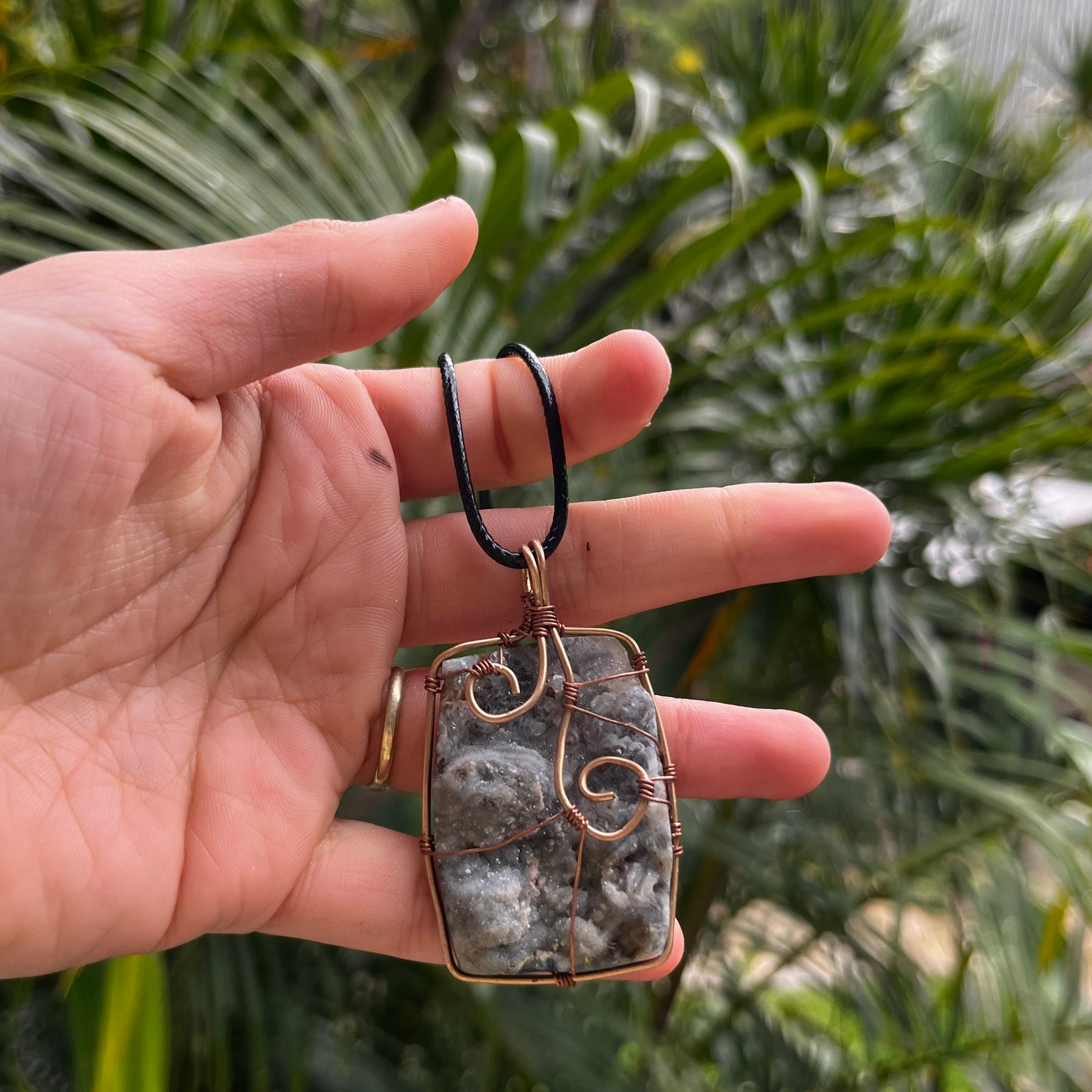 Agate and bronze pendant