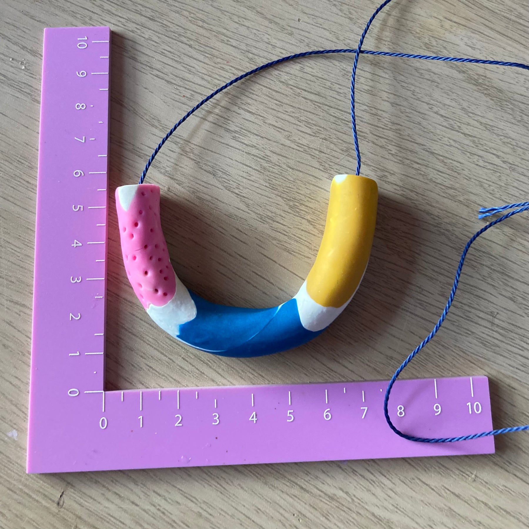 Polymer clay arch necklace