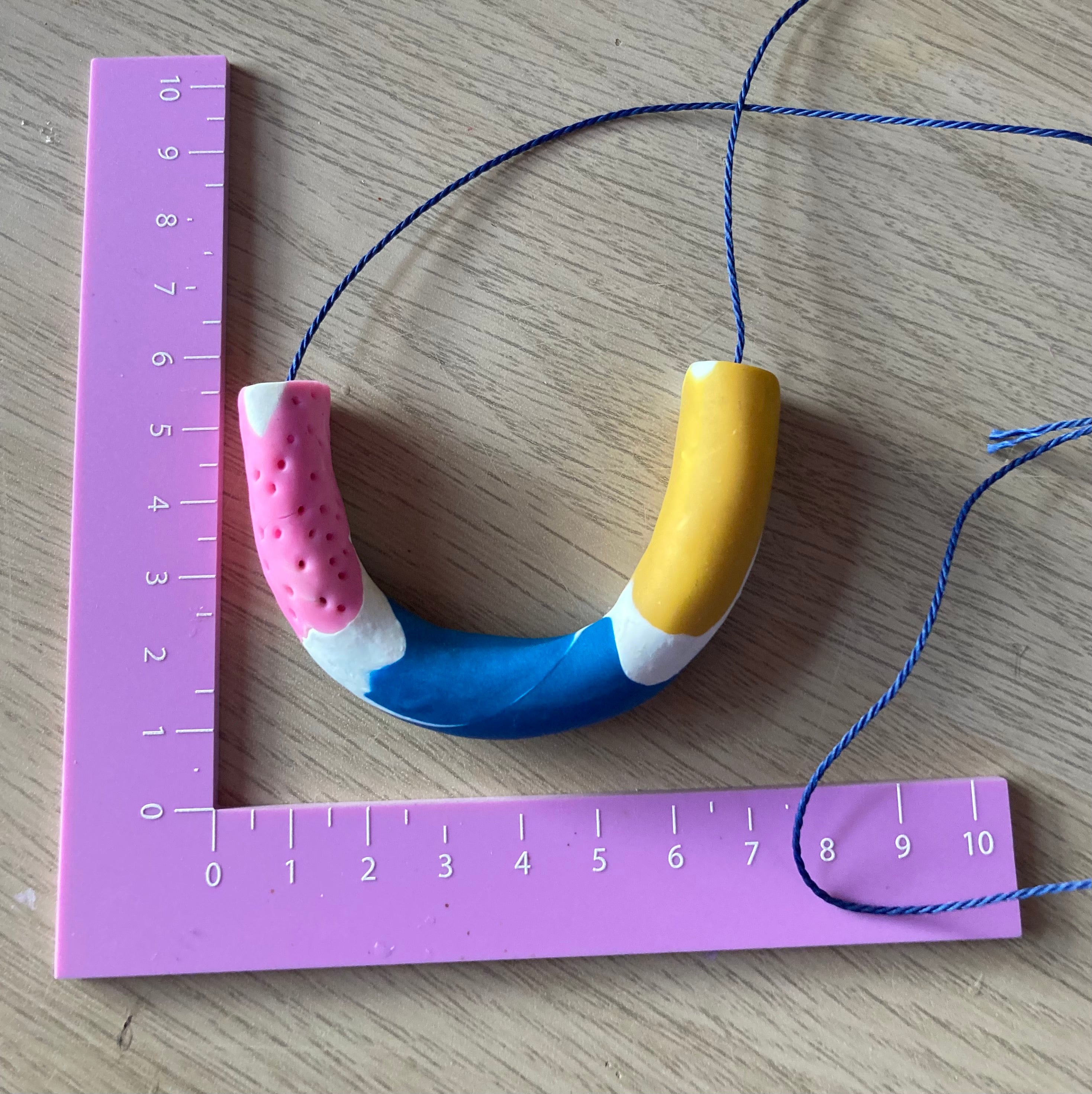 Polymer clay arch necklace