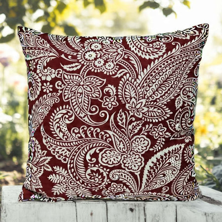 Retro-style red paisley cushion cover –  mid-century modern space.